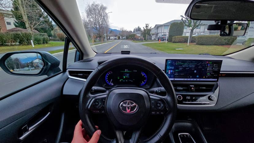 Driver view inside the Toyota Corolla Hybrid cockpit